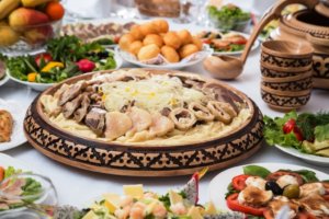A traditional Kazakhstani feast prepared by and for families of young students as they enter grade-school age.